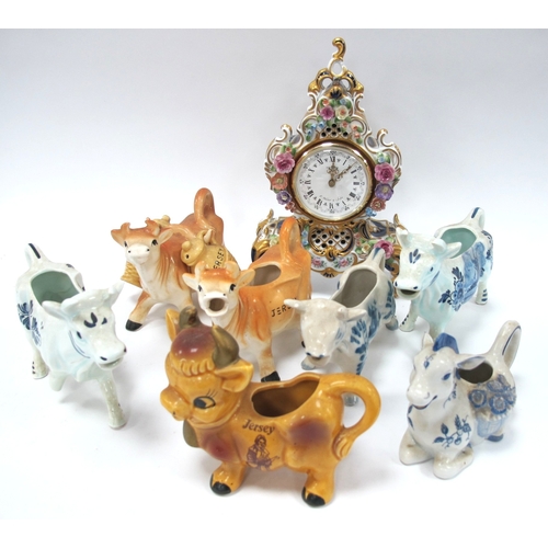 1234 - German Pottery Cased Mantle Clock, seven pottery cows:- One Tray.