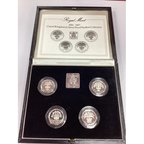 555 - 1983 Silver Proof Frosted States Of Jersey Seven Coin Set, together with a Royal Mint UK silver proo... 