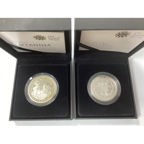 562 - Two Royal Mint 2009 UK Silver Proof Coins, including a Henry VIII £5 and a 1oz Britannia, both cased... 