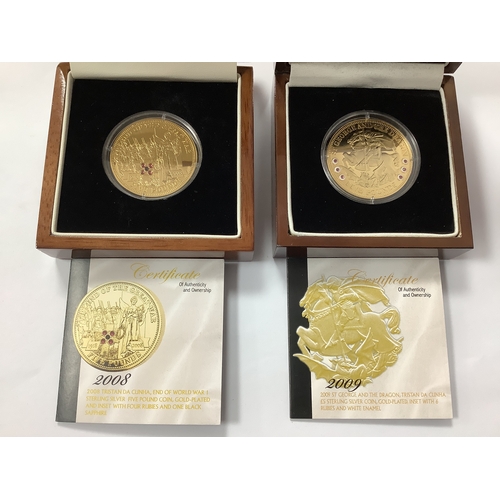 557 - Two Tristan Da Cunha Silver Proof £5 Coins, both cased with certificates of authenticity.