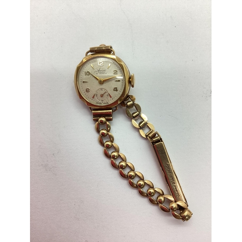 240 - Avia; 15 Jewels 9ct Gold Cased Ladies Wristwatch, the signed dial with gilt Arabic numerals, arrow m... 