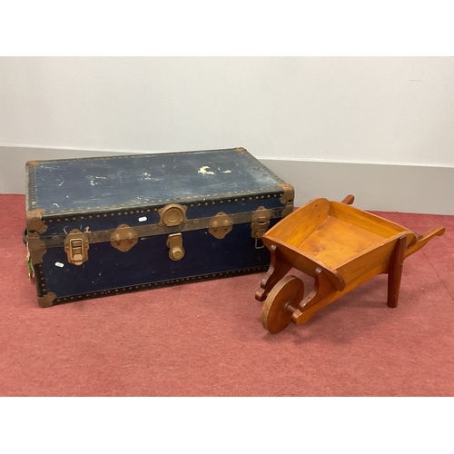 1486 - Metal Bound Travelling Trunk, 91cm wide excluding handles. Wooden posy wheelbarrow.