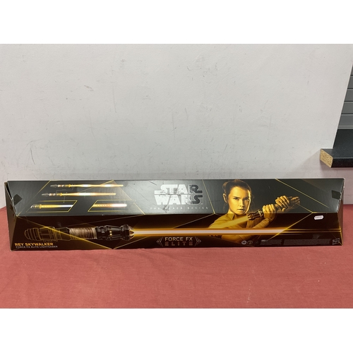 578 - A Hasbro Battery Operated Star Wars Force FX Rey Skywalker Force FX Elite Lightsaber, mostly complet... 