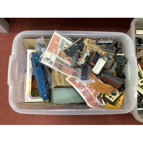 774 - A large quantity (in four tubs) of model railway workshop items including building kits, scenery, wa... 