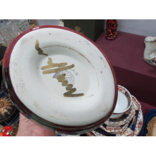 1179 - Anita Harris Cute Bunny Sniffing a Daffodil Oval Vase, gold signed 19cm high.