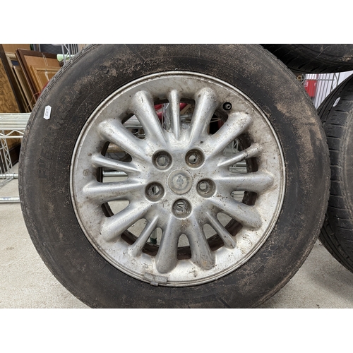 1457 - Three Chrysler Voyager Alloy Wheels (2001 to 2007) with tyres (215/65/R16) - tyres passed best.