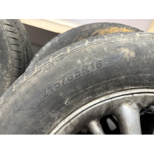 1457 - Three Chrysler Voyager Alloy Wheels (2001 to 2007) with tyres (215/65/R16) - tyres passed best.