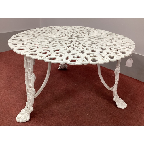 1571 - White Painted Metal Patio Table, with pierced top on three vine supports, 76cm wide.