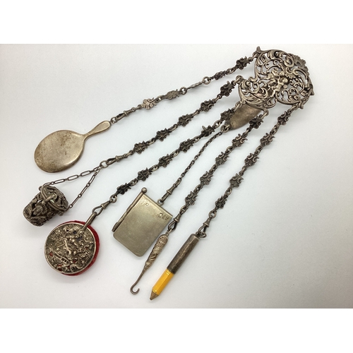 151 - A Victorian Hallmarked Silver Chatelaine, SJ, London 1898, the scroll pierced shaped panel with cher... 