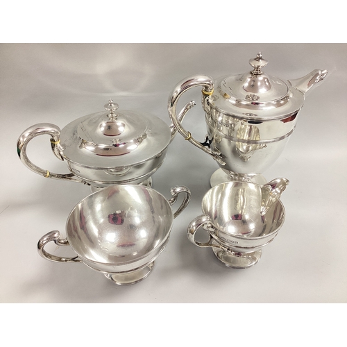 16 - Elkington & Co; A Hallmarked Silver Four Piece Teaset, London 1911, comprising coffee pot, teapot, c... 