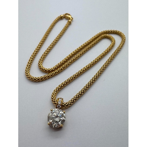 172 - An 18ct Gold Fancy Link Chain, suspending a single stone diamond pendant, brilliant round claw set, ... 