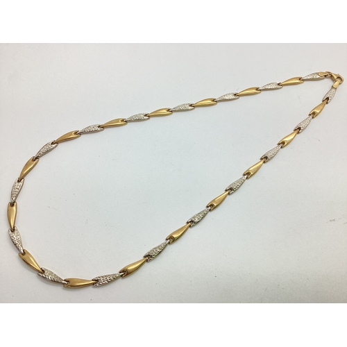 179 - A 9ct Gold Two Tone Panel Collarette Necklace, the shaped plain panels alternate with white panels o... 