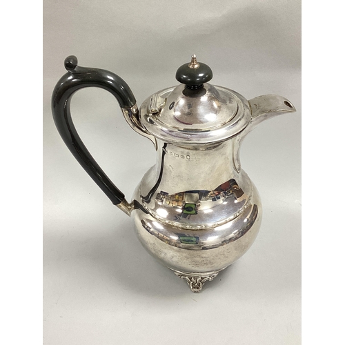 18 - A Hallmarked Silver Coffee Pot, A.L.D, Birmingham 1934 Jubilee mark, of sinuous baluster form with b... 