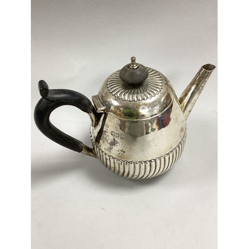 20 - William Hutton & Sons; A Victorian Hallmarked Silver Bachelor Teapot, London 1898, of baluster form ... 