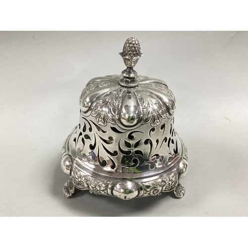 24 - A Hallmarked Silver Mounted Counter Top / Desk Bell, SWS, Birmingham 1900, of scroll pierced design ... 