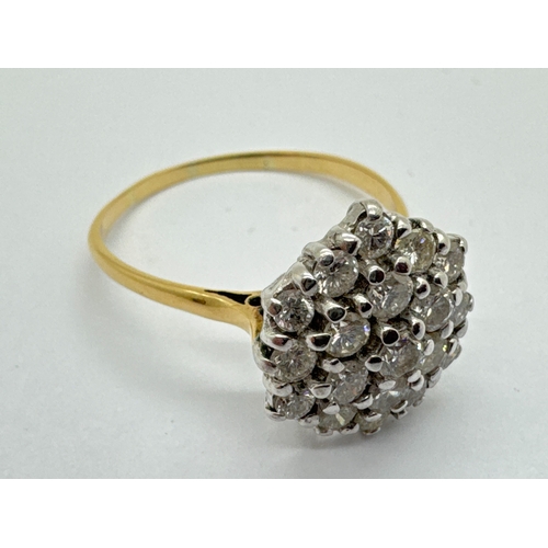 252 - A Large Diamond Cluster Ring, of hexagonal form, claw set throughout with brilliant cut stones (fing... 