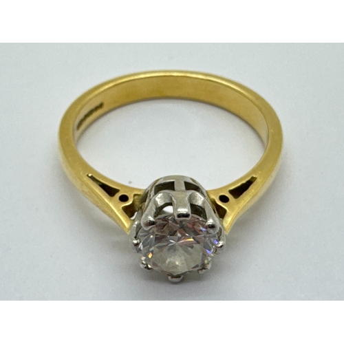 258 - A Modern 18ct Gold Single Stone Diamond Ring, the (6mm) brilliant cut stone claw set, between plain ... 