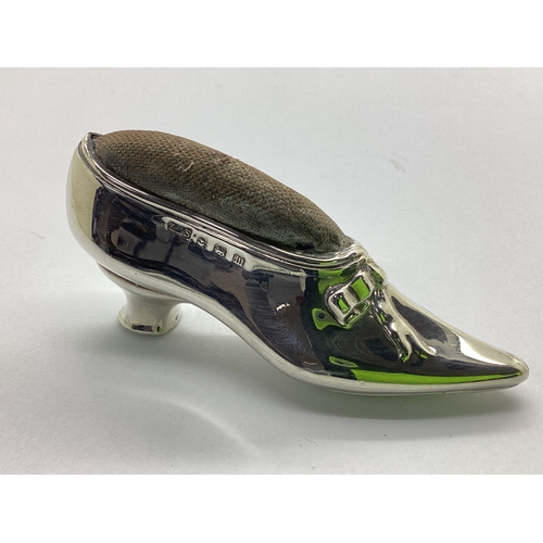 26 - A Novelty Pin Cushion in The Form of A Ladies Shoe, Levi & Salaman, Birmingham 1911, with tied bow d... 