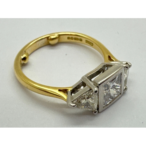 261 - A Modern 18ct Gold Princess and Trillion Cut Three Stone Diamond Ring, collet rubover set to the cen... 