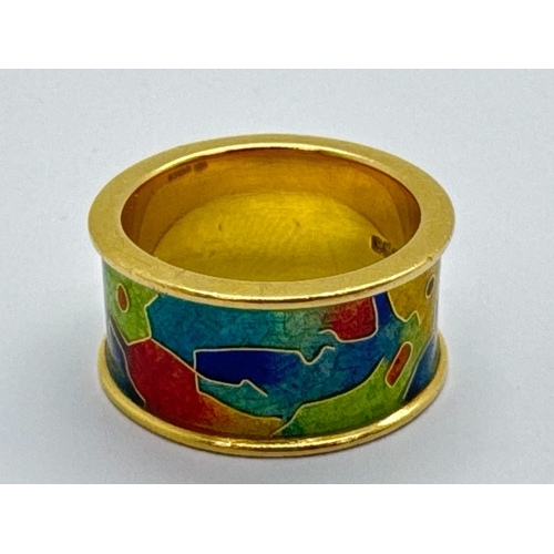 277 - Fred Rich Enamel Designs; A Modern 18ct Gold Abstract Enamel Ring, the wide band highlighted in oran... 