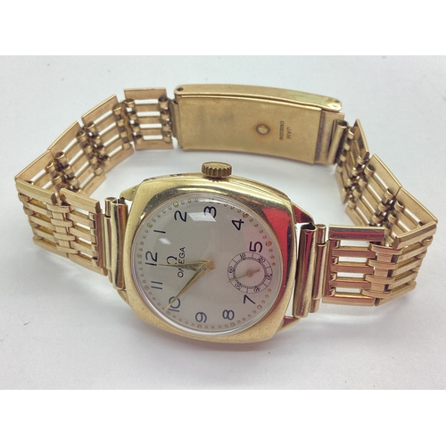 315 - Omega; A Vintage 9ct Gold Cased Gent's Wristwatch, the signed champagne dial with gilt roundlet bord... 