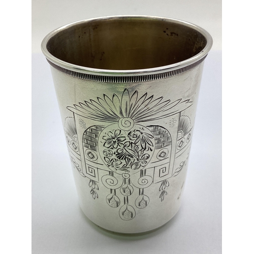 35 - A Russian Kiddush Cup, of tapering cylindrical form with engraved decoration and inscribed 