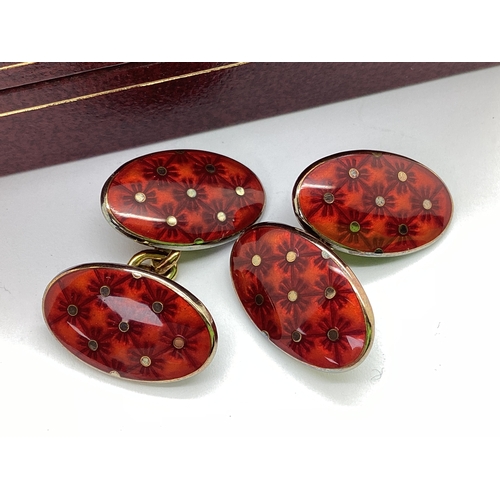 363 - A Pair of Modern 9ct Gold and Enamel Cufflinks, the oval panels highlighted in burnt orange, on chai... 