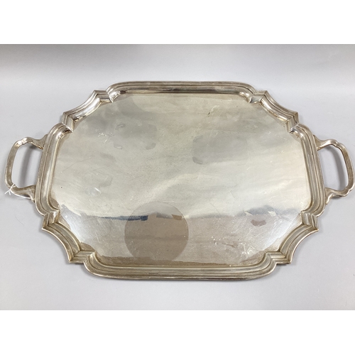 39 - A Hallmarked Silver Twin Handled Serving Tray, CB&S, Sheffield 1934, of shaped rectangular form with... 