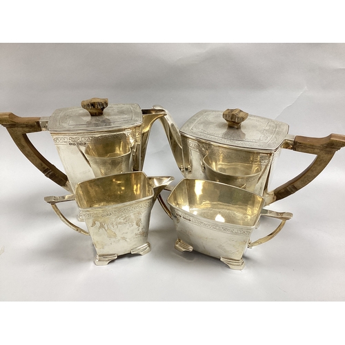 51 - Stower & Wragg; A Hallmarked Silver Four Piece Art Deco Teaset, Sheffield 1938, each of shaped angul... 