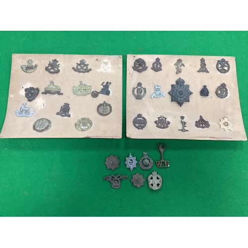 418 - Assorted British Army Cap Badges, in two glazed/framed cases attached to cards and loose, including ... 