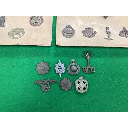 418 - Assorted British Army Cap Badges, in two glazed/framed cases attached to cards and loose, including ... 