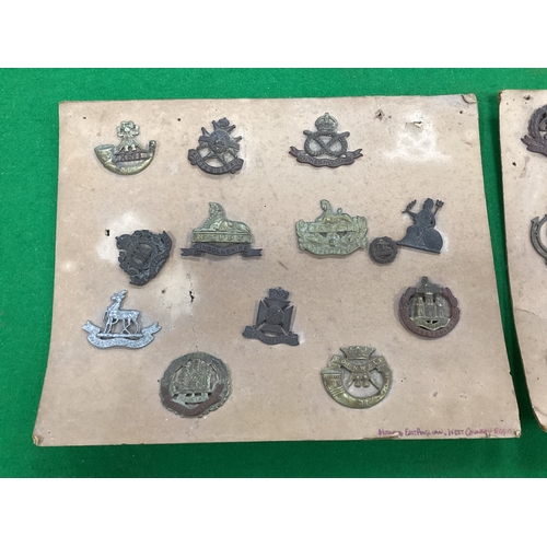 418 - Assorted British Army Cap Badges, in two glazed/framed cases attached to cards and loose, including ... 
