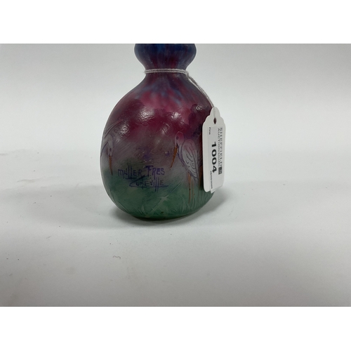 1004 - A Muller Fréres Luneville Cameo Glass Vase, of compressed onion shaped form, decorated in tones of g... 