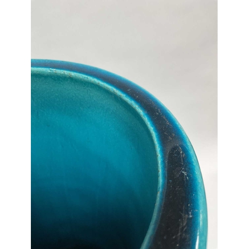 1123 - A Burmantofts Pottery Faience Stick Stand, decorated in a turquoise glaze, the cylindrical body moul... 