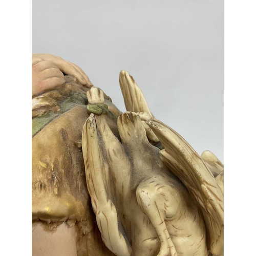 1045 - A Royal Dux Porcelain Figure Group, modelled as peasants, he with geese held over his shoulder, the ... 