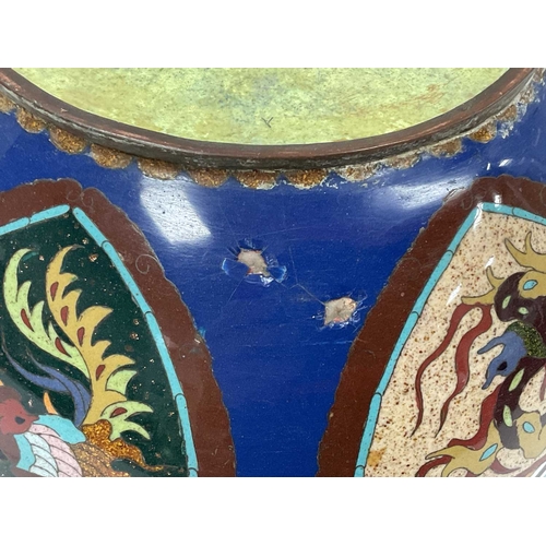 1135 - A Japanese Cloisonné Enamel Bowl, decorated with panels of phoenix within a floral background, 15cm ... 