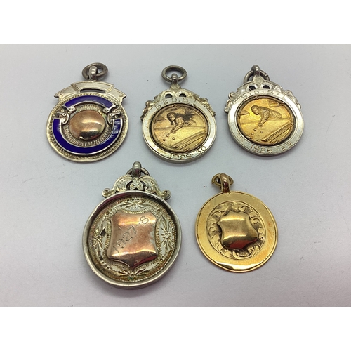 97 - A 9ct Gold Medallion Fob, of circular form with partial engraved decoration and vacant shield cartou... 