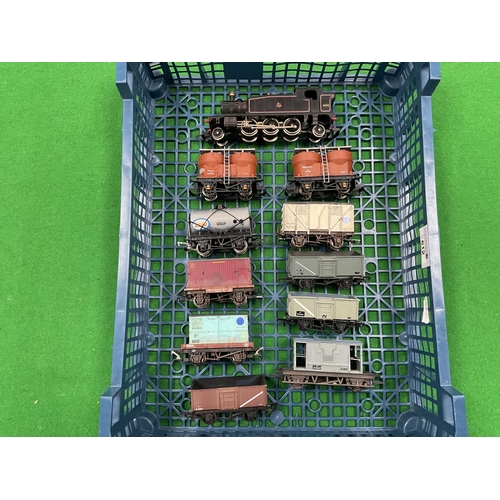 612 - A 00 gauge mixed goods train comprising a Lima 45xx 2-6-2 tank engine in BR black, nine wagons and a... 