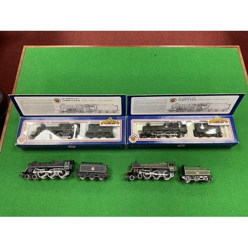615 - Four 00 gauge, BR standard 4MT class 4-6-0 locomotives by Bachmann and Mainline: two boxed (one in g... 