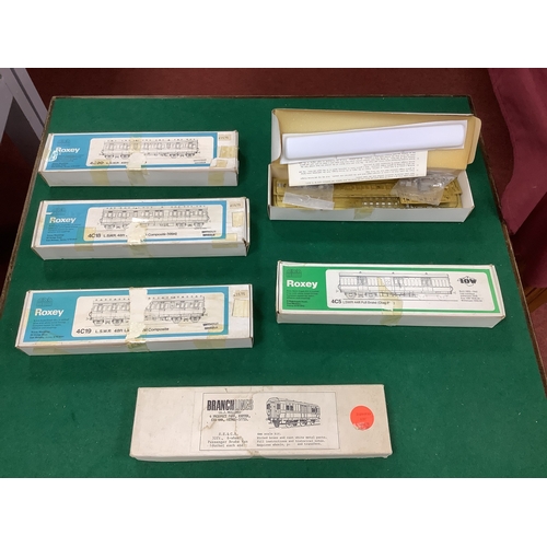 619 - Six 4mm scale (00 gauge) coach kits, five LSWR 48/44 ft bogie coaches by Roxey and an SECR 32ft six-... 