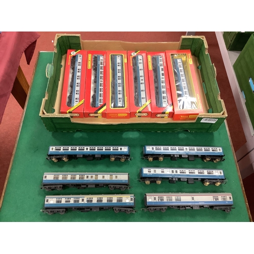 634 - Twelve 00 gauge BR Blue Grey coaches by Triang and Hornby, six boxed including three Sleeper Cars, p... 
