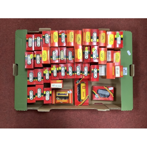 648 - Approximately forty-three boxed Hornby 00 gauge four wheel wagons and brake vans.