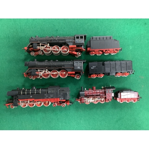 656 - Four Fleischmann HO scale German locomotives: a 2-8-4 tank engine; an 0-6-0 and tender (apparently r... 