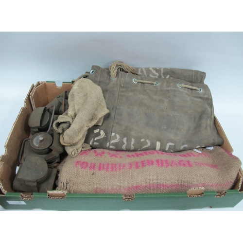 1104 - Military Green Canvas Bag, hessian sack, four military black out lamps.