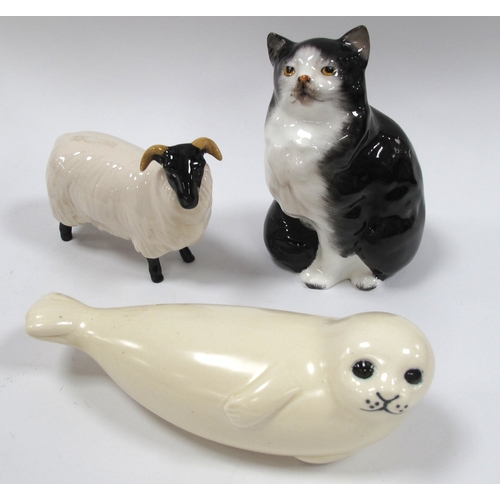 1264 - Lisa Larson, Sweden ceramic seal in cream, 16cm long. Doulton cat, Beswick sheep (3).