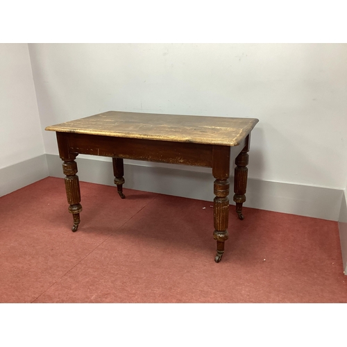 1511 - A XIX Century Pine Table, with rectangular top on turned, reeded legs.