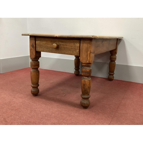 1516 - A XIX Century Pine Table, with rectangular top and single drawer, raised on turned and block support... 