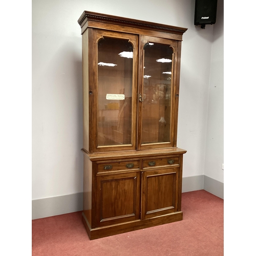 1528 - An Early XX Century Mahogany Bookcase, the top with dentil cornice over twin glazed doors, the base ... 