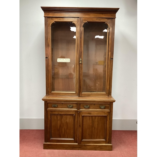 1528 - An Early XX Century Mahogany Bookcase, the top with dentil cornice over twin glazed doors, the base ... 