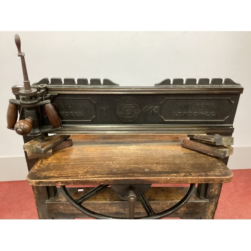 1540 - XIX Century 'Harrild Sons Fleetworks London' Cast Iron Printing/Cutting Press, on oak stand with cas... 